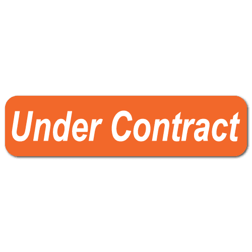 Orange and white Under Contract stickers for real estate documents