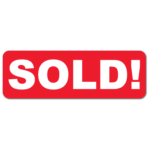 Red and white rectangular Sold stickers for real estate documents